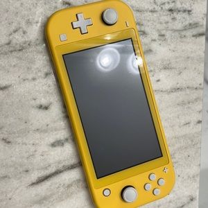 Yellow switch lite. used slightly. and brand new Pokémon violet.